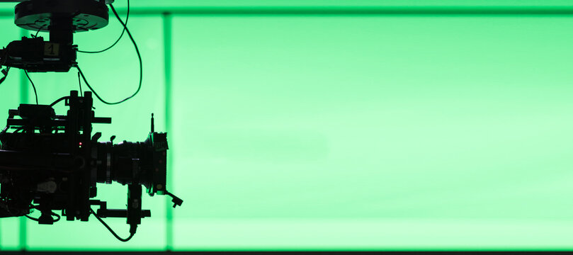 Studio camera with green screen background shooting on the set