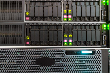 The front panel of hosting servers is in the datacenter. Computer hardware works in the server...