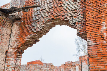 Ruined walls of an old glass factory of the 19th century, built in the Baroque style in the Siberian outback in the Krasnoyarsk Territory