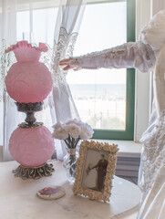 Bride looking out window