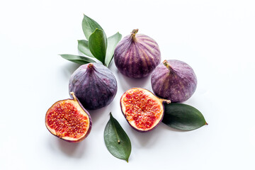 Fresh purple fig fruit with leaves. Close up