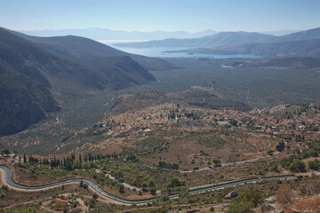 Naklejka premium Archaelogical site of Delphi, Greece. Delphi is ancient sanctuary that grew rich as seat of oracle that was consulted on important decisions throughout ancient classical world. UNESCO World heritage