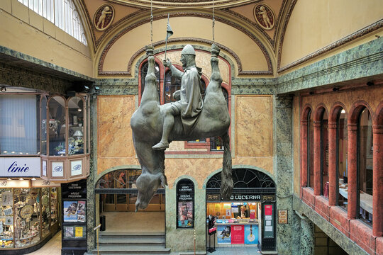 The Anti-Vaclav sculpture representing St. Wenceslas seated on the belly of his dead horse. The sculpture is located in the Lucerna Palace of Prague, Czech Republic.