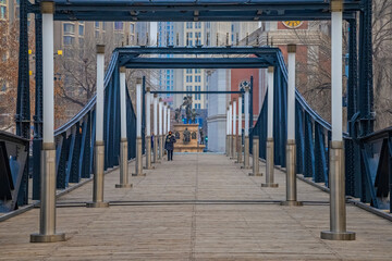 Fototapeta na wymiar Tianjin pedestrian wooden bridge over Haihe river in Nankai district in Tianjin, China