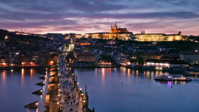 sunset over Charles Bridge and Prague Castle, Czech Republic
