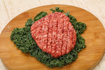 Raw beef burger cutlet for cooking
