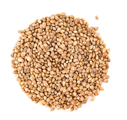 Hemp seeds isolated on white background. Dry seeds of cannabis, hemp or marijuana. Top view.
