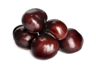 Pile of horse chestnuts isolated on white