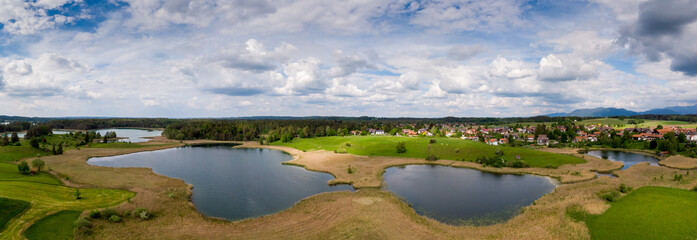 Aerial view panorama of lake Osterseen and Iffeldorf