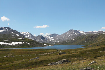 mountain landscape of taiga mountains and blue sky