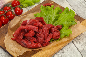 Raw beef meat sliced for cooking