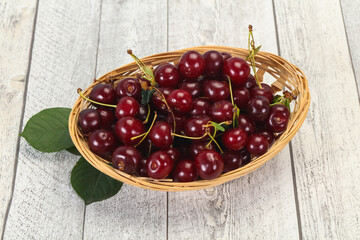 Sweet ripe cherry with leaves