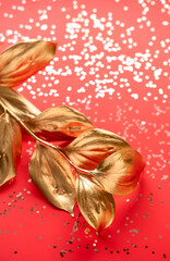Golden leaf design elements on red background. Decoration elements for invitation, wedding cards, valentines day, greeting cards. Shiny and sparkle design.