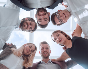 Fototapeta na wymiar close up. group of young business people standing in a circle.