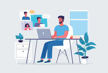 Young man works online at home office 