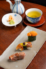 fine nigiri sushi set on wooden table