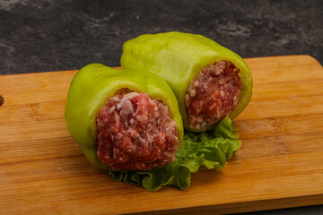 Raw stuffed pepper for cooking