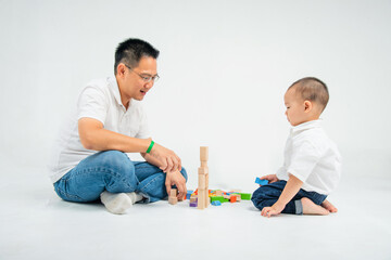 little toddler play toy with his father