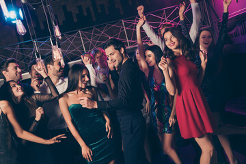 Photo portrait of cute couple dancing at party with other people