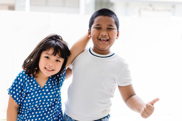 Equality and Racism.Asian kid girl and african american boy in school.Black lives matter no racism.Children with unity and friendship.Kids boy and girl.black lives matter for revolution protest.People