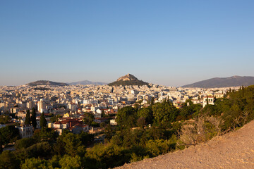 Wide view of Athens Cityscape and Mount Lycabettus at Sunset Scenic view