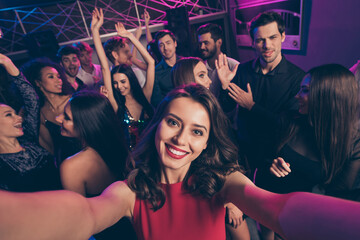 Self photo portrait of cute girl at party celebrating new year