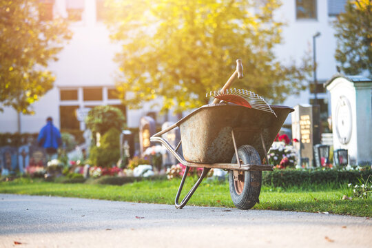 Gardening concept: Close up of a wheelbarrow in a park