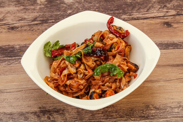 Asian wok noodle with mussels