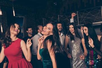 Attractive glad smart elegant cheerful crowd lovers couples dancing having fun event in dark night music club indoors © deagreez