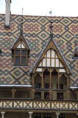 Colored flat tiles historic roof