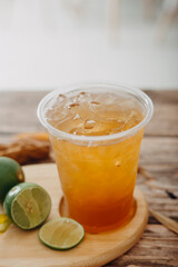 Various refreshing drinks in glasses with ice. Apple juice, cola, homemade lemonade, iced coffee, iced fruit tea and sparkling water on beige background. Copy space