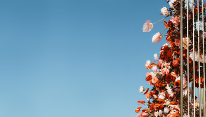 red flowers against blue sky, Ready layout for text message or content. Holiday card, copy space