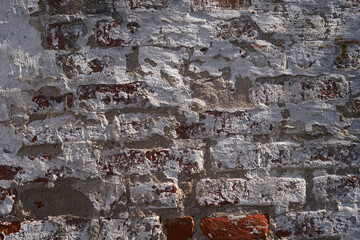 The surface of the outer wall of the old brick building