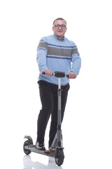 in full growth. casual mature man with electric scooter