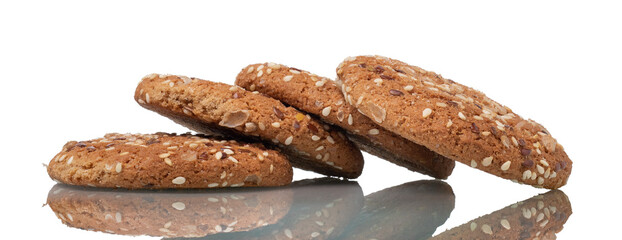 Several oatcakes with sunflower and flax seeds isolated on white background. Concept of healthy food.