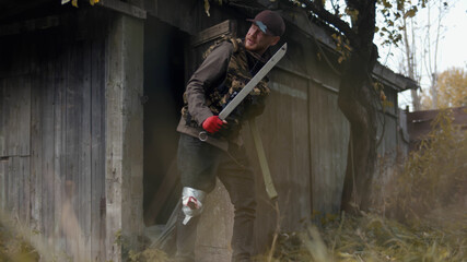 Man with wounded leg leaving shed surviving in post apocalypse world