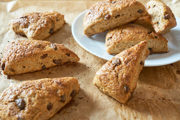 Traditional fresh baked English homemade scones with raisins for breakfast.  
