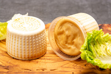 Cheese collection, italian soft smoked burrata cheese made from mozzarella with cream inside in region Apulia