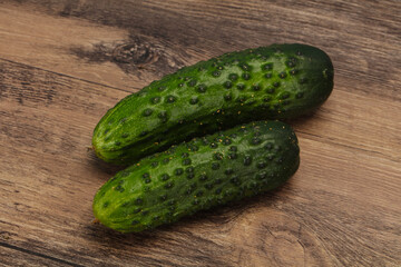 Ripe fresh green two cucumbers
