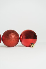 red christmas balls white background and last lucid sphere