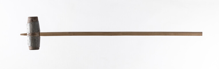 ancient wooden viking hammer isolated on white background
