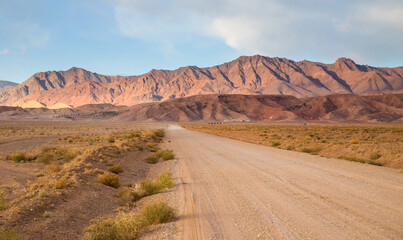Desert under mountains