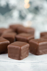Domino stones, a german traditional christmas sweet with gingerbread, marzipan and jelly covered with brown chocolate, Dominosteine