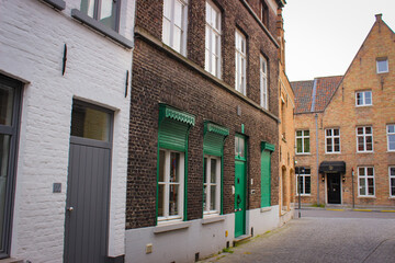 Bruges, Belgium - May 12, 2018: Unique Street With Medieval Houses