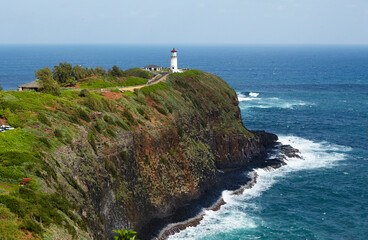 Fototapeta na wymiar The Kilauea lighthouse and bird observatory in Kauai by the Pacific Ocean