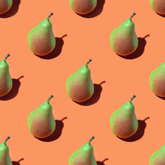 Juicy pears pattern. Colorful seamless pattern of fresh pears on a orange background. Fresh ripe organic pears isolated on a orange surface. Vegan, vegetarian healthy food.