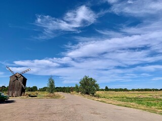 landscape with windmill and sky