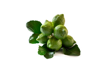 binch of green lemons isolated on white