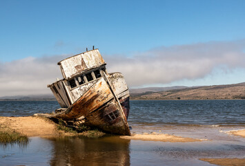 Point Reyes shipwreck, an abandoned boat in Inverness California, Point Reyes National Seashore - Powered by Adobe