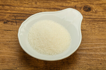 White sugar in the bowl